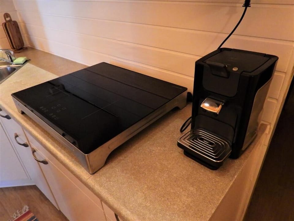 Fridge, stovetop, coffee/tea maker, electric kettle
