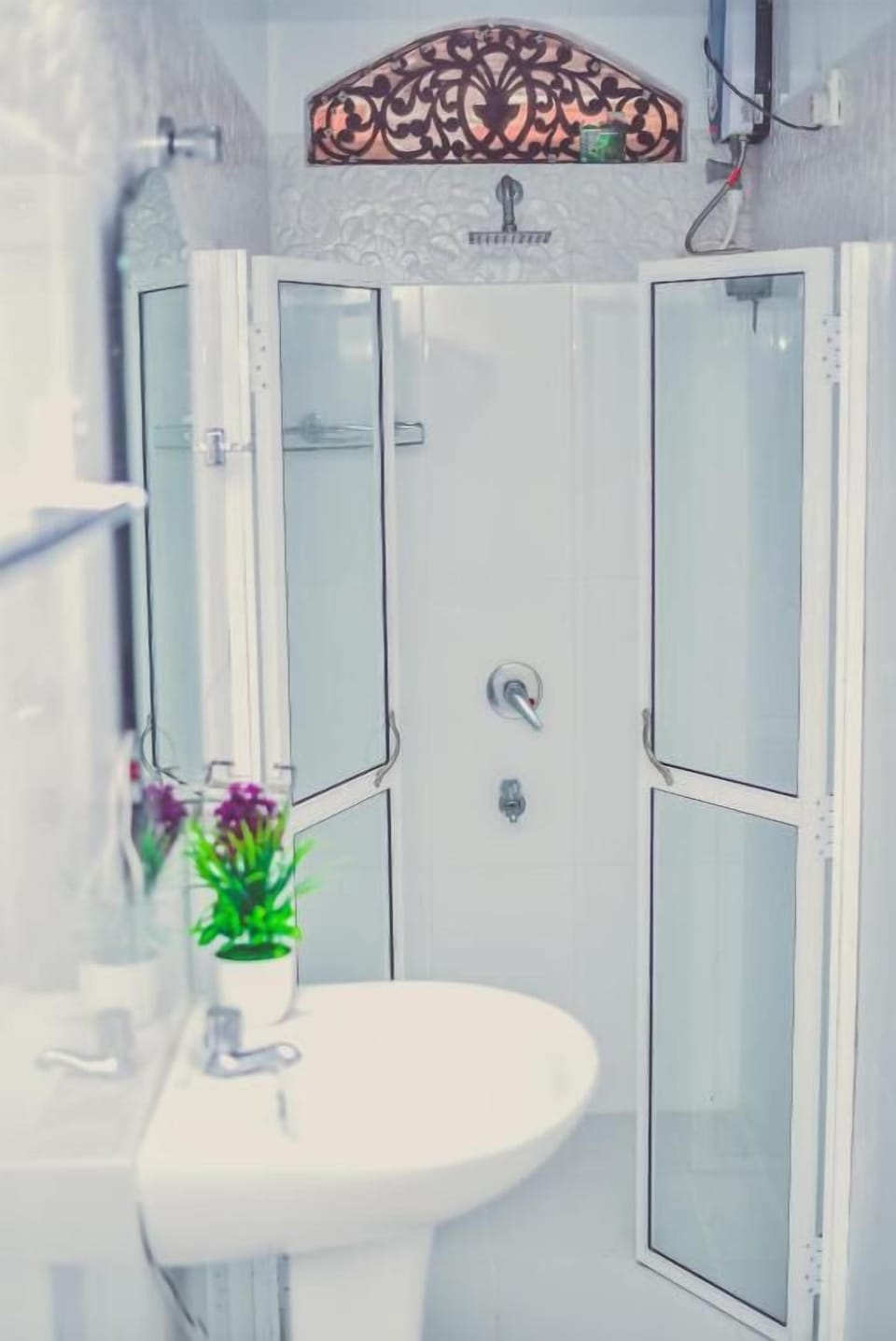 Shower, rainfall showerhead, bidet, towels