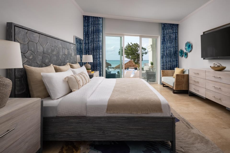 East Bay Beachfront Swim-up Butler Suite (BSUP) | Minibar, in-room safe, soundproofing, iron/ironing board