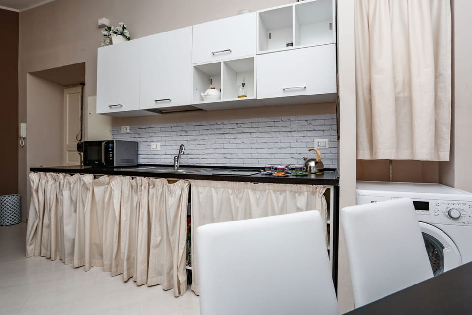 Apartment, 2 Bedrooms | Private kitchen | Full-size fridge, oven, stovetop, coffee/tea maker
