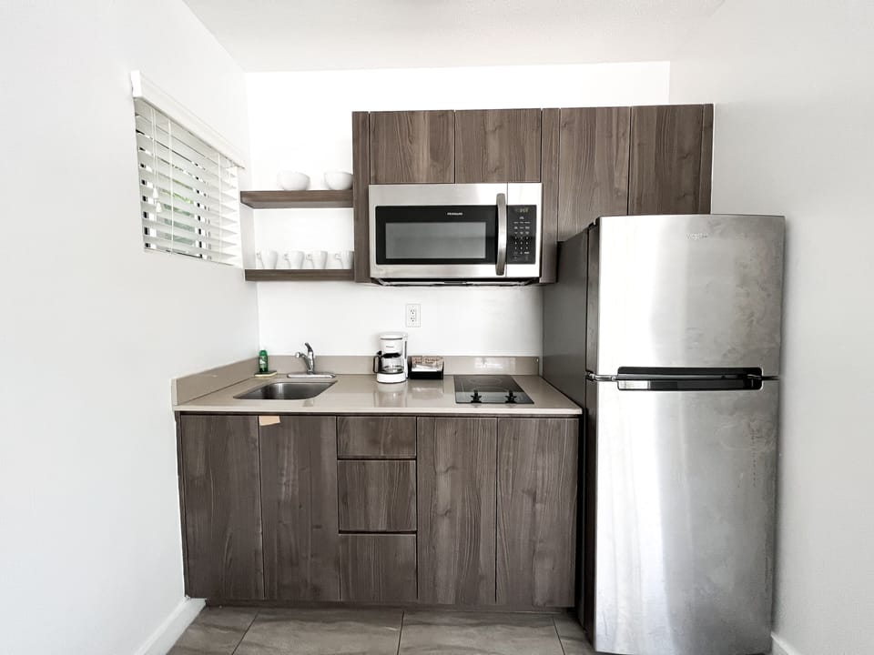 Deluxe Studio, 2 Queen Beds | Private kitchen | Fridge, microwave, coffee/tea maker, paper towels