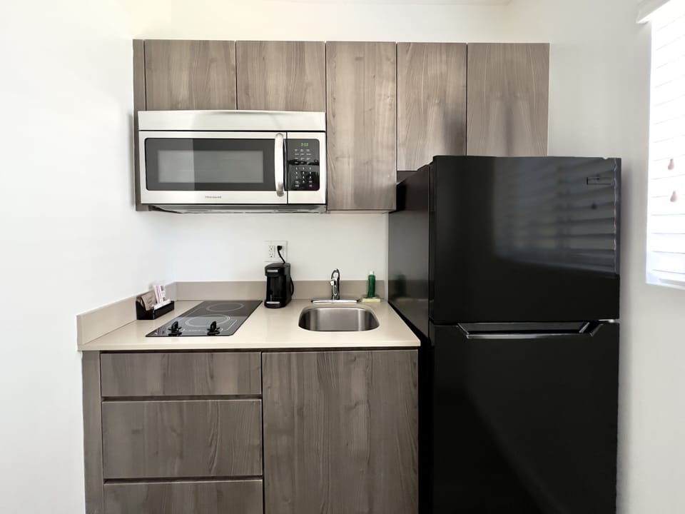 Fridge, microwave, coffee/tea maker, paper towels