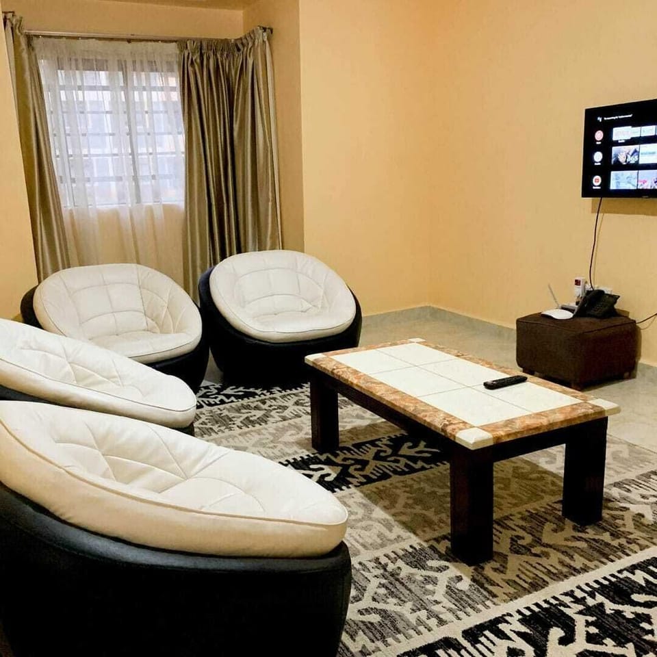 Deluxe Apartment, 3 Bedrooms, Non Smoking | Living area | TV
