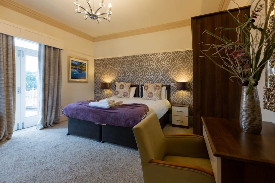Super King Double Room | Memory foam beds, rollaway beds, free WiFi, bed sheets