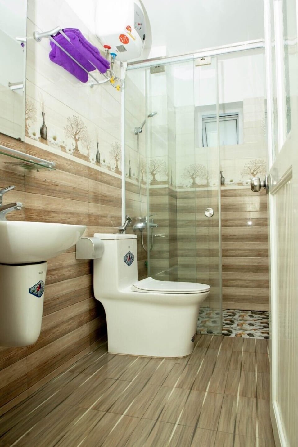 Shower, free toiletries, hair dryer, slippers