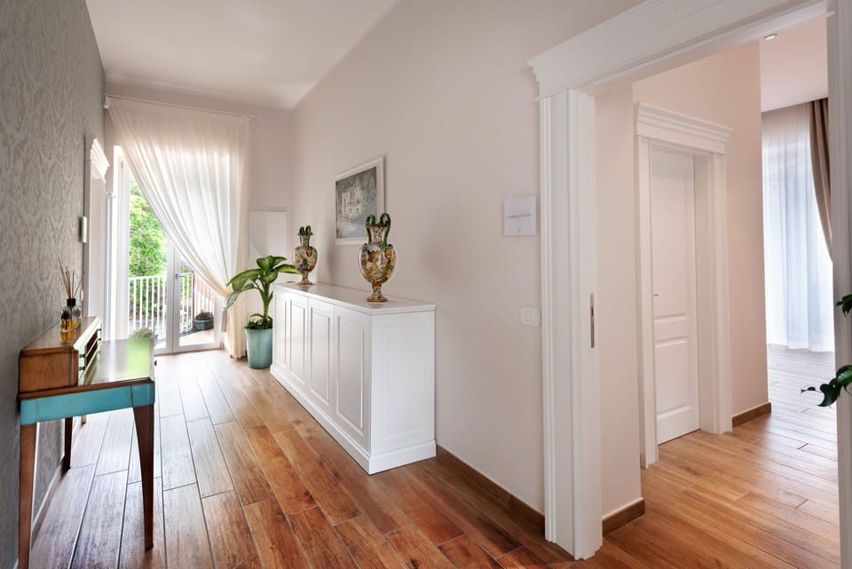 Deluxe Room, Garden View | Living area | 24-inch TV with digital channels