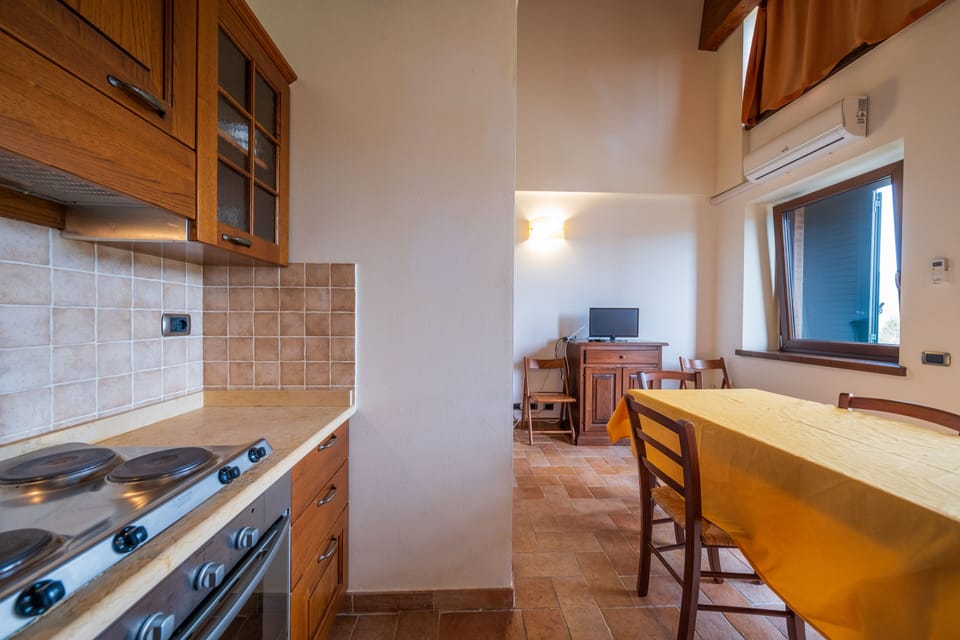 Standard Apartment, 2 Bedrooms | Living area | Flat-screen TV