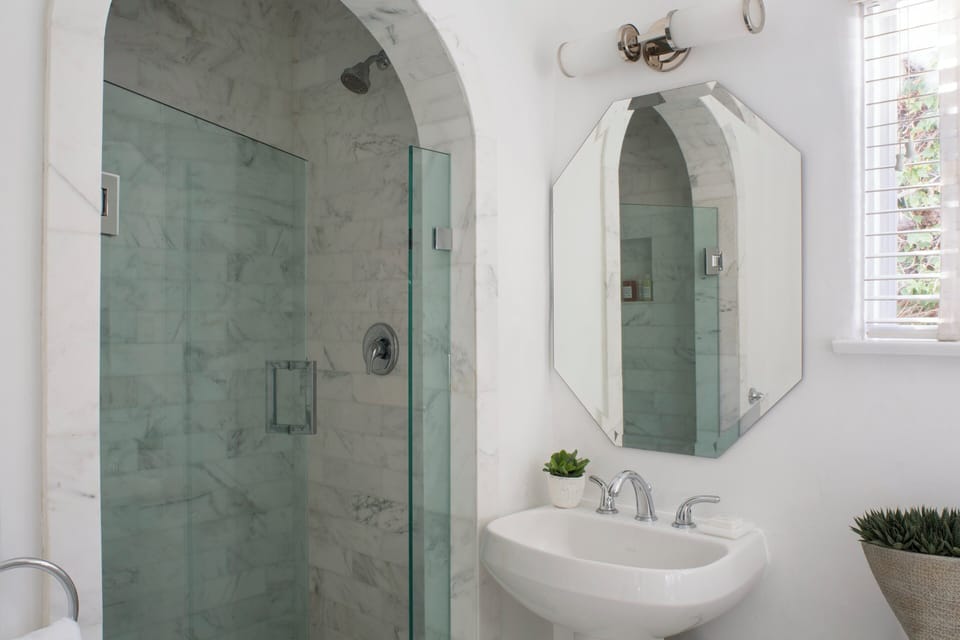 Designer toiletries, hair dryer, bathrobes, towels