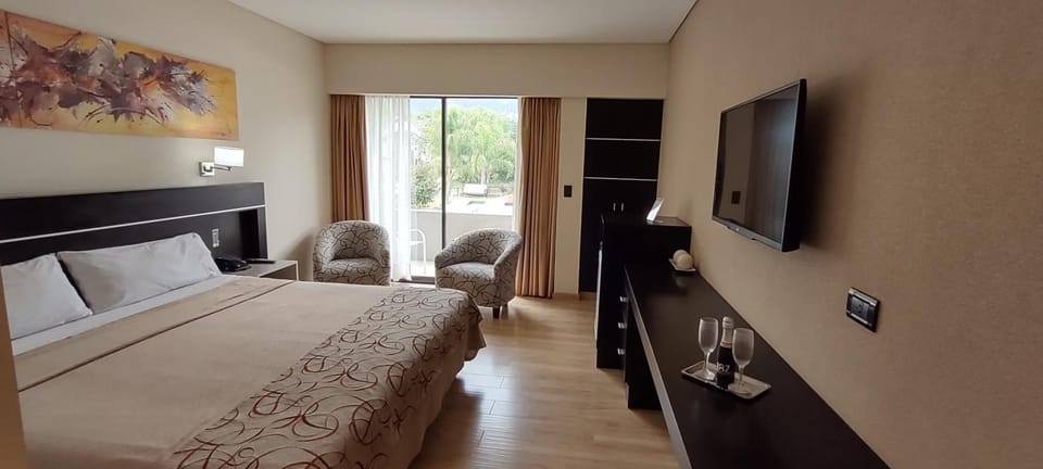 Free minibar items, in-room safe, blackout drapes, iron/ironing board