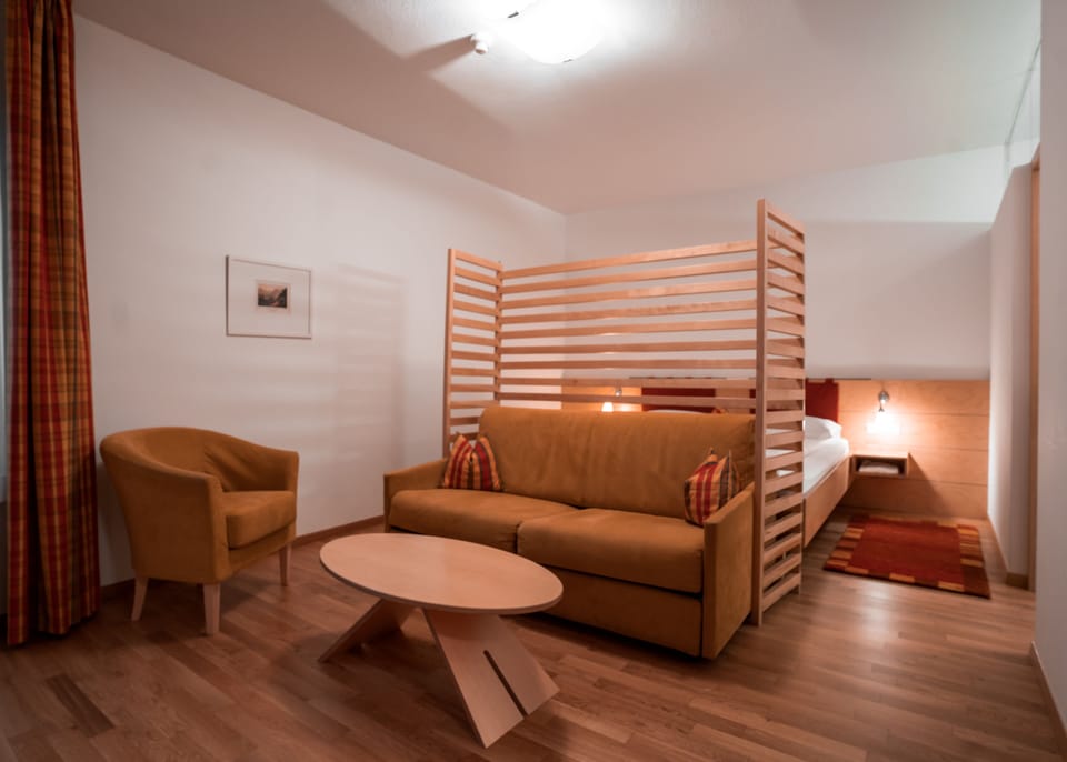 Junior Suite, Non Smoking | Minibar, in-room safe, desk, laptop workspace
