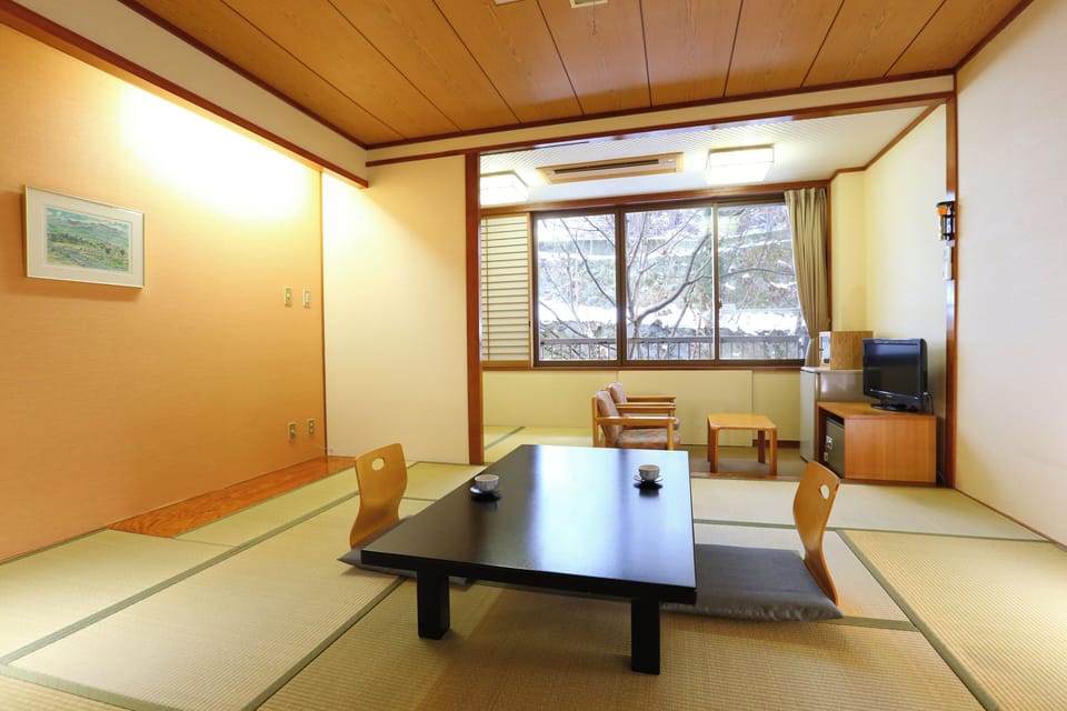 Standard Japanese-Style-Room with 12 Tatami mats - Indoor Bath - Non-Smoking | In-room safe, bed sheets
