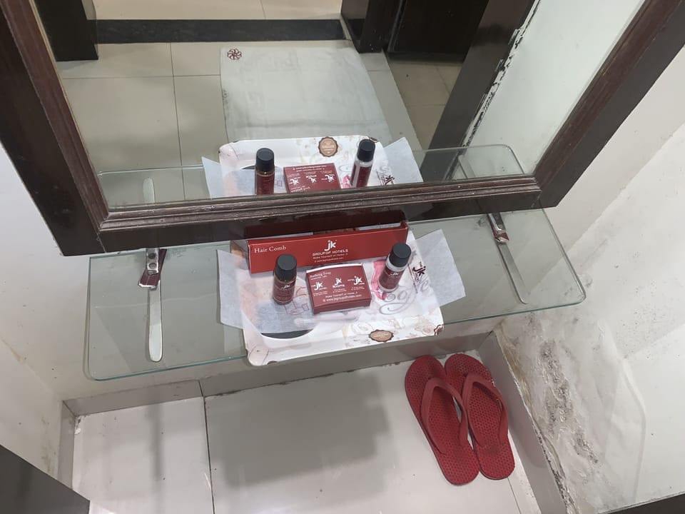 Deluxe Double Room, Accessible, City View | Bathroom | Shower, rainfall showerhead, designer toiletries, slippers