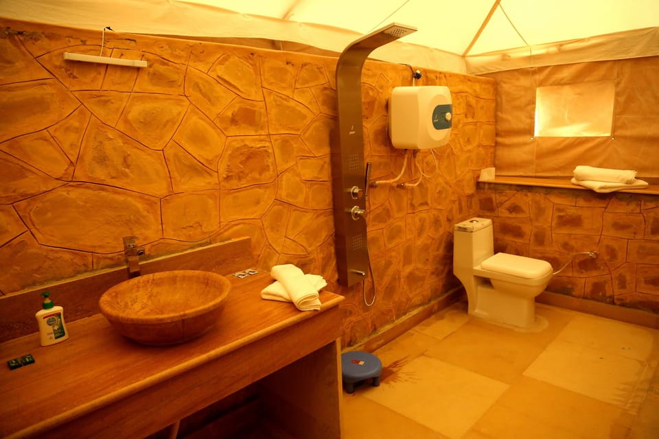Luxury Tent, 1 King Bed, Non Smoking, Resort View | Bathroom | Shower, rainfall showerhead, free toiletries, towels