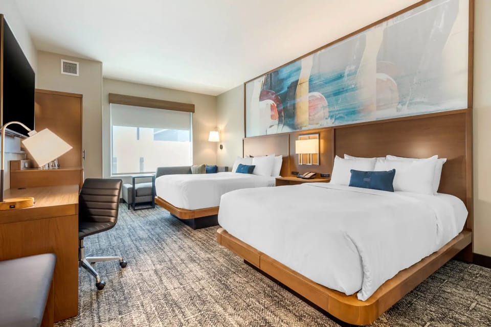 Premium bedding, down comforters, pillowtop beds, desk