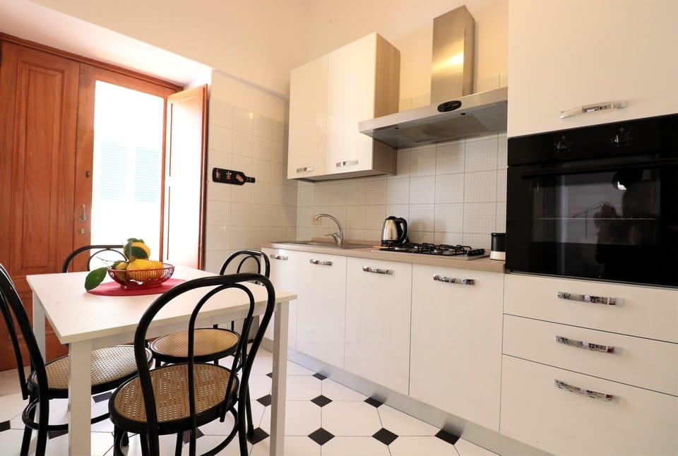 Apartment, 1 Bedroom, Balcony, Beachside | Private kitchen | Full-size fridge, microwave, stovetop, coffee/tea maker