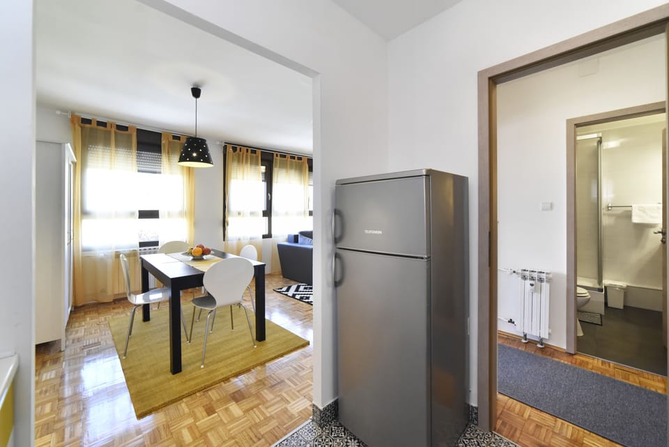 Apartment, 2 Bedrooms | Living area | Flat-screen TV