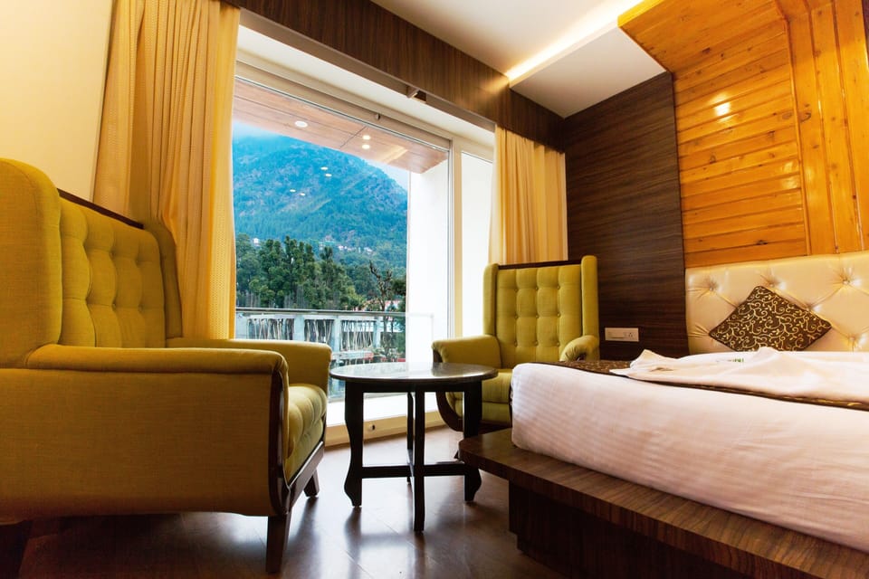 Premium Room, 1 King Bed, Smoking, Hill View | Desk, laptop workspace, soundproofing, iron/ironing board