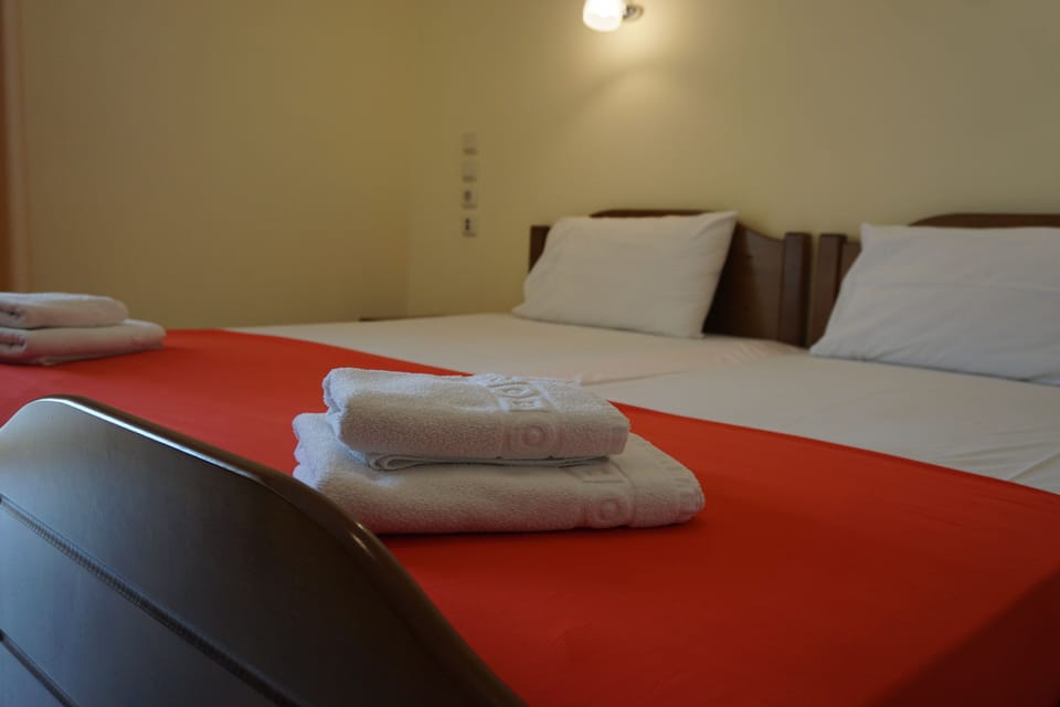 Double or Twin Room, Sea View | Laptop workspace, blackout drapes, free WiFi, bed sheets