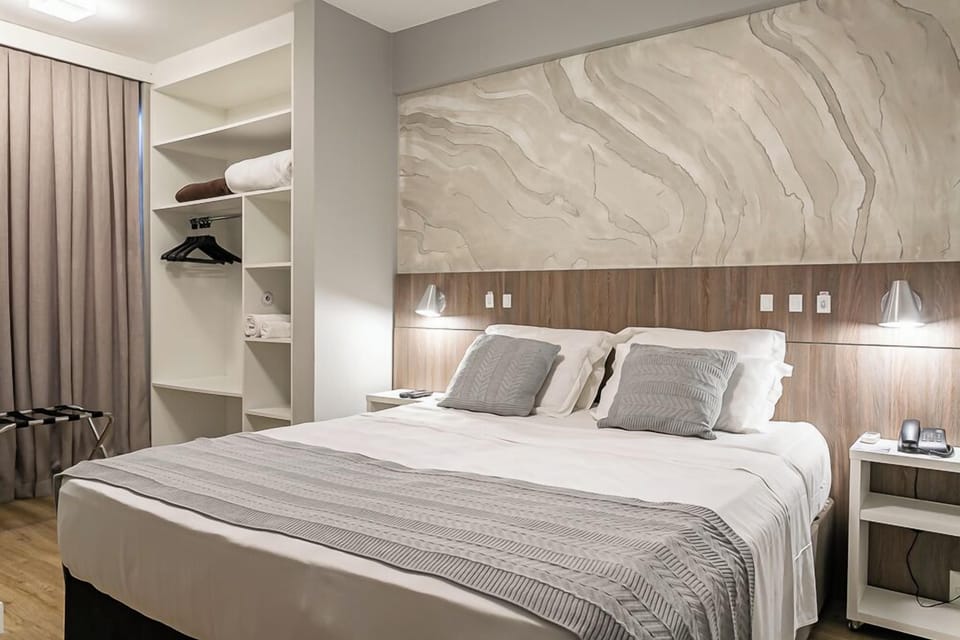 Superior Double Room | Minibar, desk, laptop workspace, blackout drapes