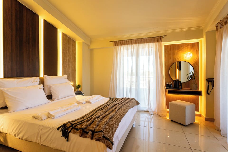 Junior Suite -Outdoor Jacuzzi | Memory foam beds, minibar, in-room safe, individually decorated
