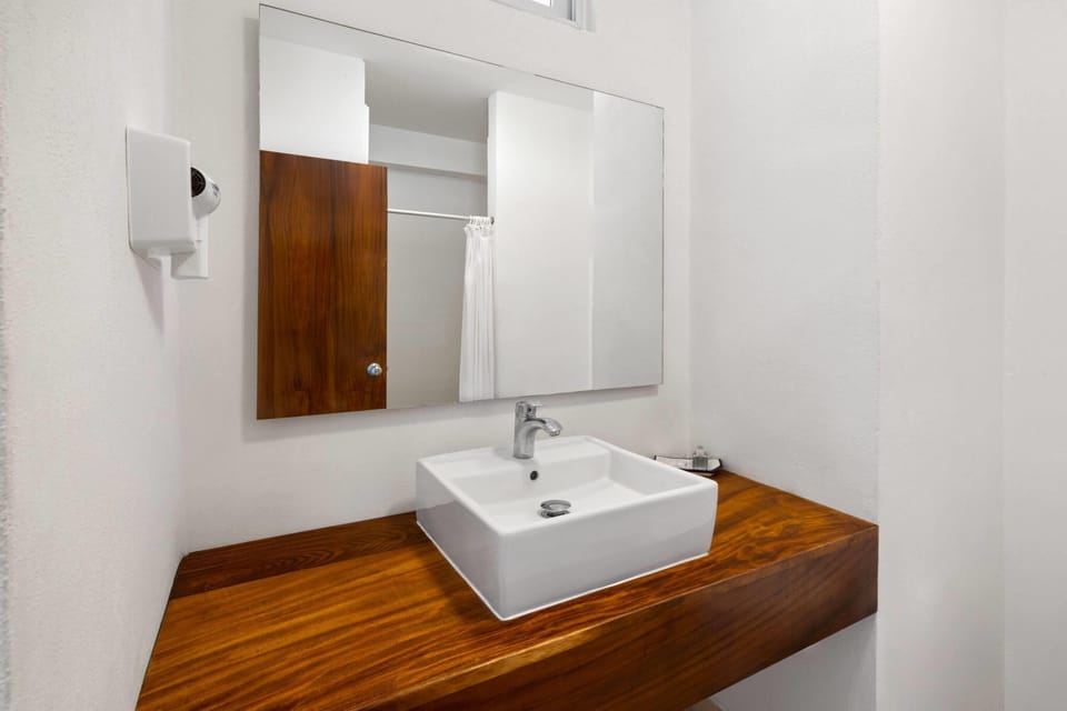 Shower, eco-friendly toiletries, hair dryer, towels
