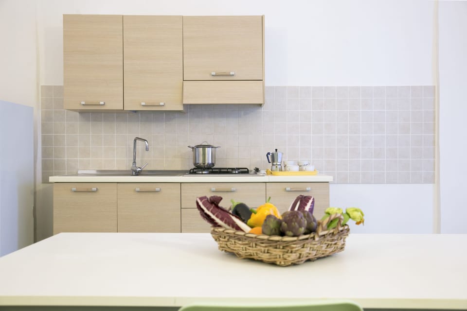 Junior Suite, 1 Bedroom, Kitchenette | Living area | TV