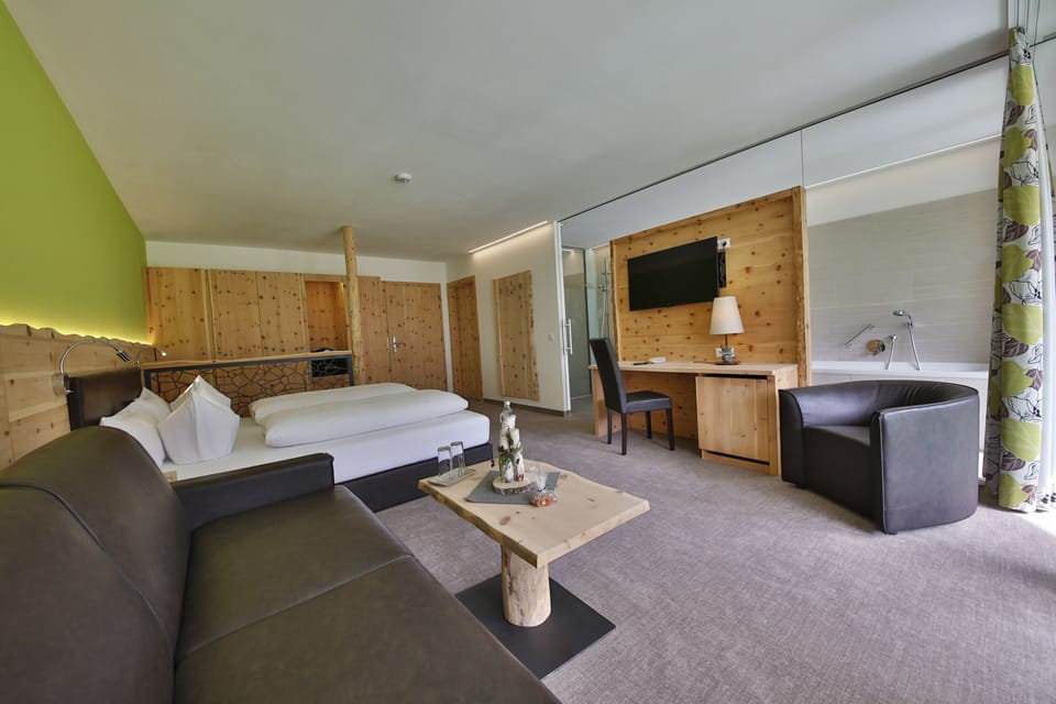 Junior Suite, Lake View | Minibar, desk, laptop workspace, cribs/infant beds