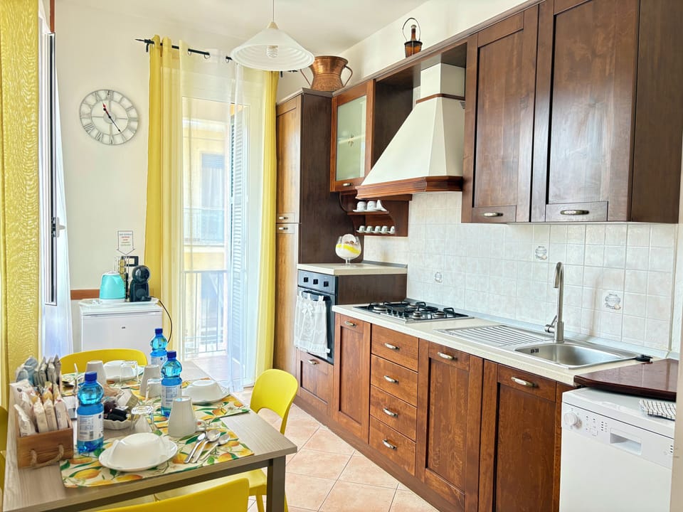 Triple Room, Balcony | Private kitchen | Fridge, espresso maker, coffee/tea maker, electric kettle