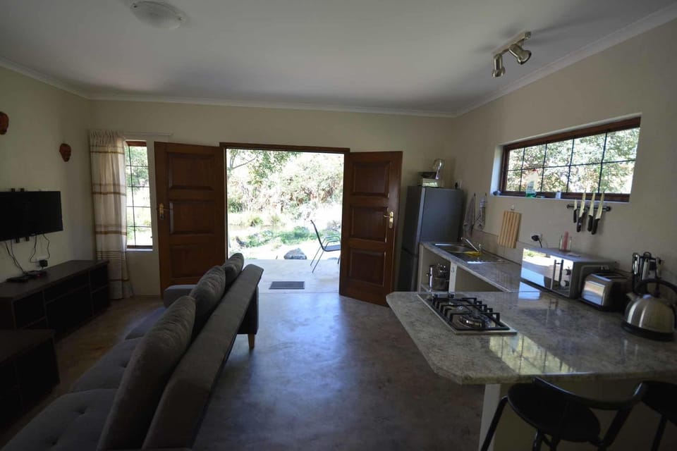 Superior Cottage, 1 King Bed with Sofa bed, River View (Mills) | Living area | 32-inch LED TV with satellite channels