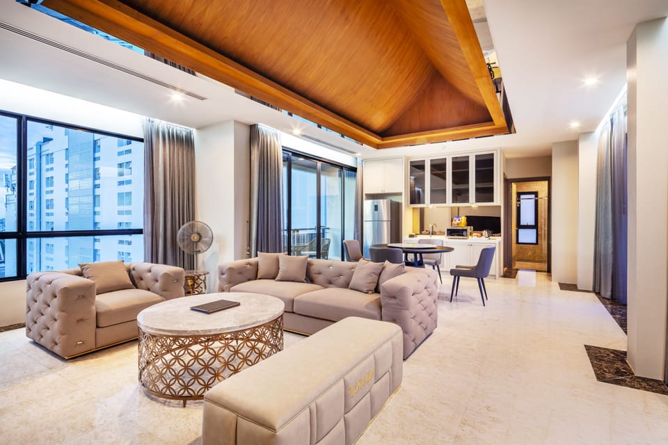 Family Villa with Private Pool | Living room | 55-inch flat-screen TV with cable channels, TV