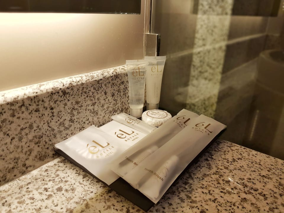 Shower, slippers, bidet, towels