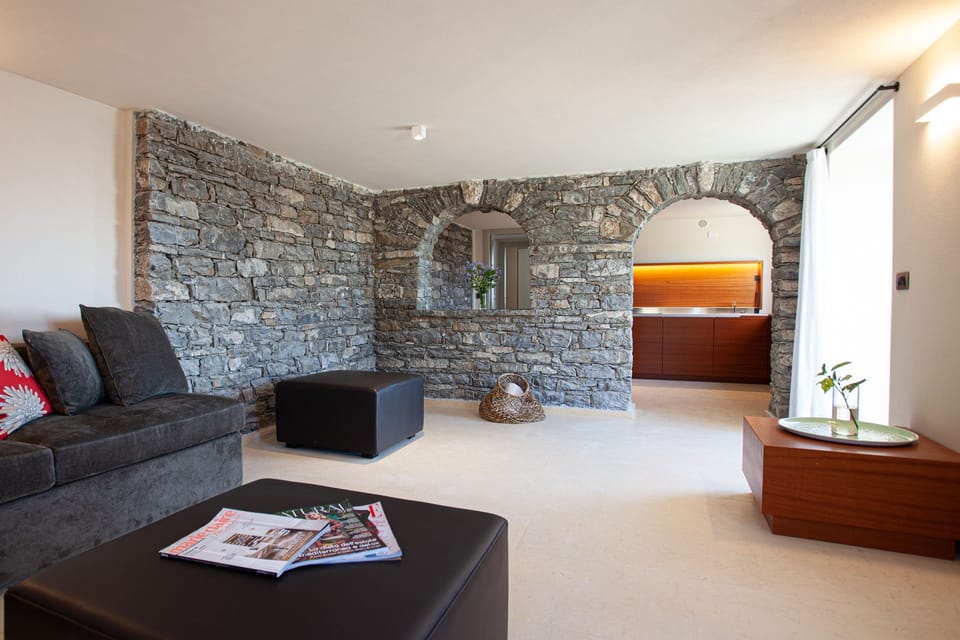 Superior Suite, 1 Bedroom, Sea View | Living area | Flat-screen TV