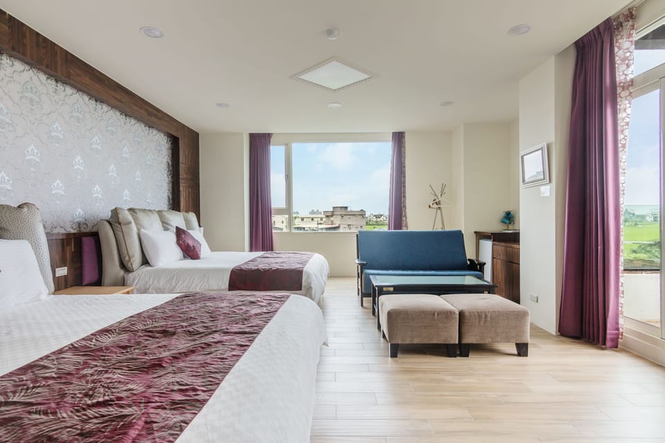 Deluxe Room, 2 Queen Beds, Courtyard View | Down comforters, desk, blackout drapes, free WiFi
