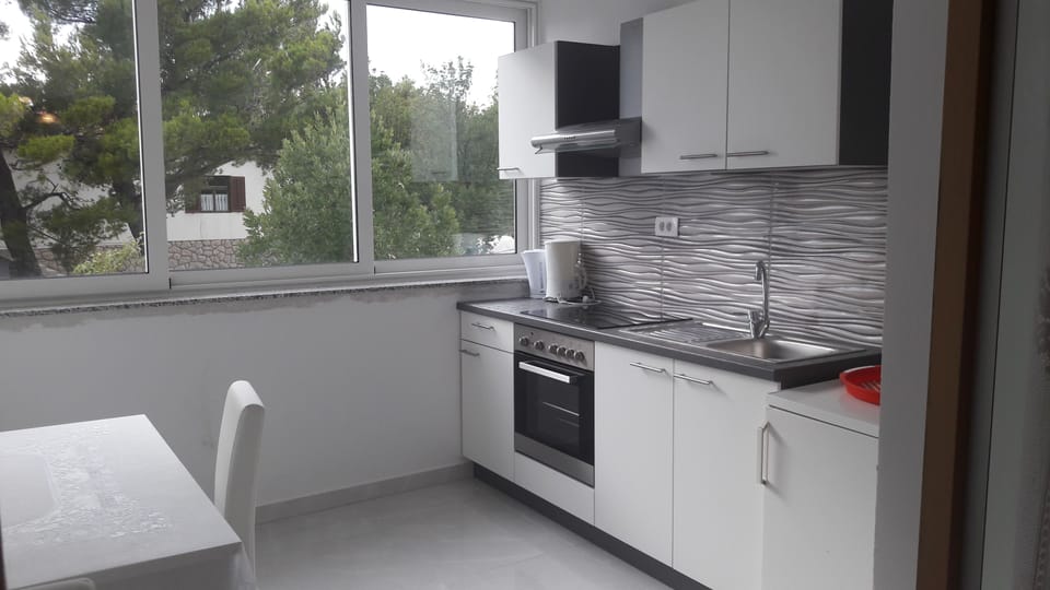 Apartment, 1 Bedroom, Partial Sea View, Beachside | Private kitchen | Fridge, freezer