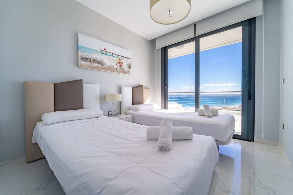 Exclusive Apartment, 3 Bedrooms, Sea View | Iron/ironing board, bed sheets