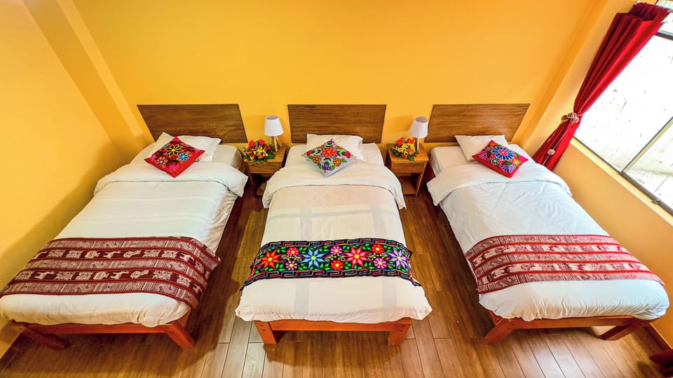 Habitacion Triple (3 camas) | Iron/ironing board, free WiFi, bed sheets