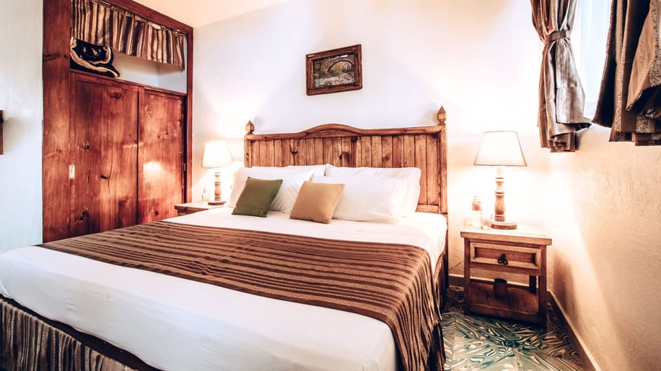 Comfort Room, Multiple Beds, Garden View | Down comforters, desk, blackout drapes, WiFi (free)