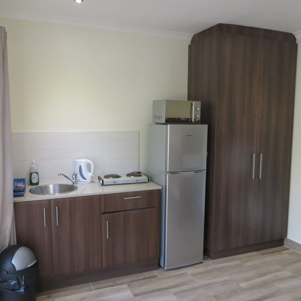 Standard Apartment (Bachelor) | Private kitchen | Coffee/tea maker, electric kettle