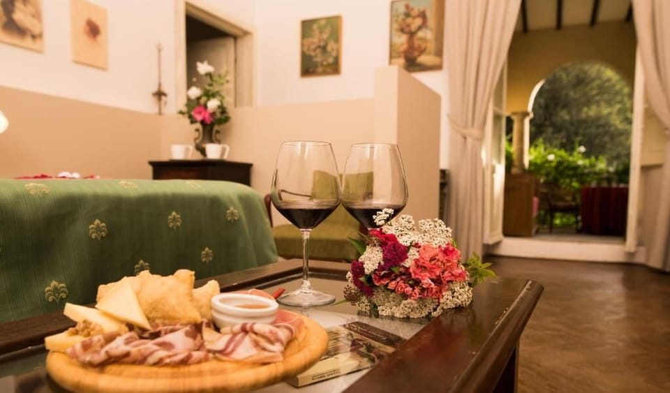 Deluxe Double Room, Balcony, Garden View | Dining | Dinner served