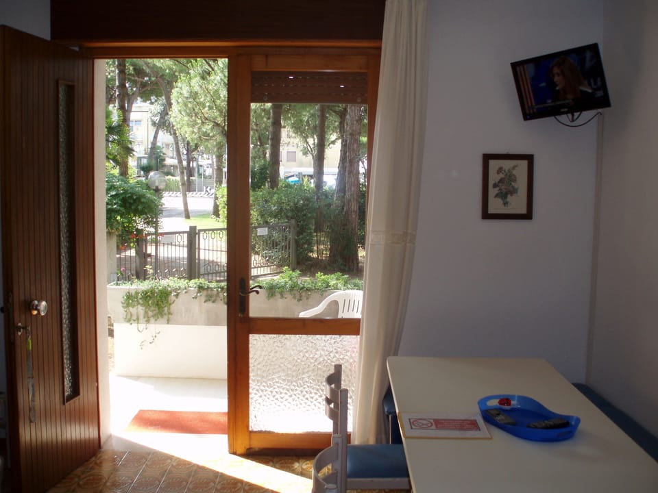 Family Apartment, 2 Bedrooms, Courtyard View, Ground Floor | Living area | Flat-screen TV