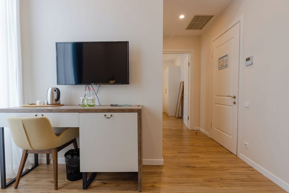 Superior Suite | Living area | Plasma TV