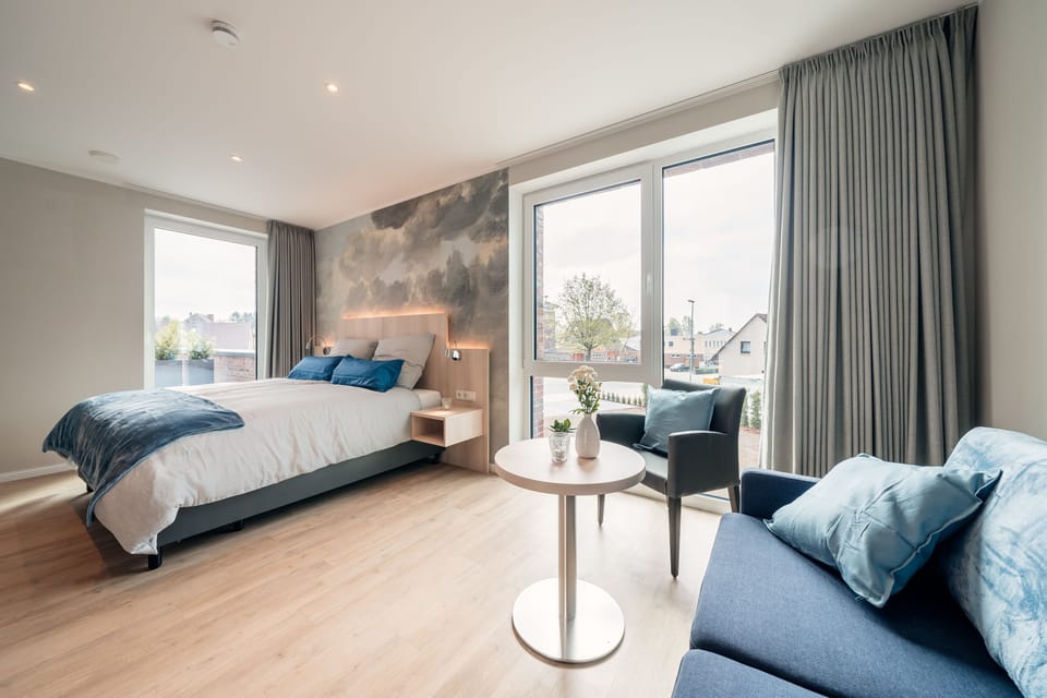 Deluxe Double Room, Garden View | Living area | Flat-screen TV