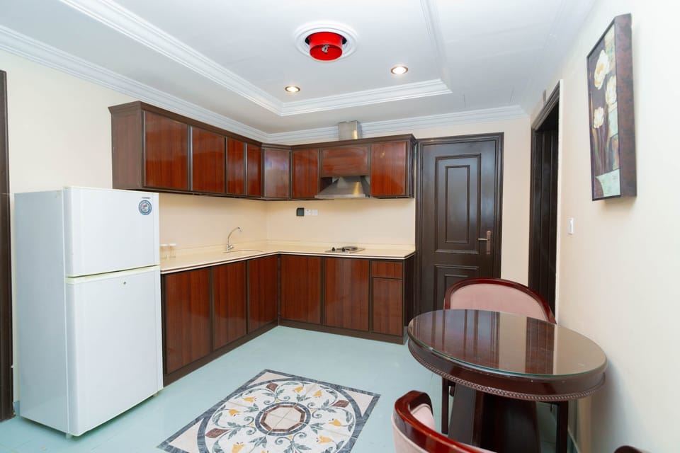 Suite, 2 Bedrooms | Private kitchen | Mini-fridge