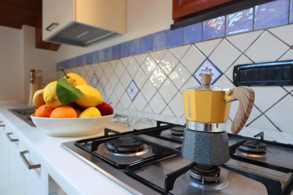 Apartment, 2 Bedrooms | Private kitchen | Full-size fridge, stovetop, espresso maker, coffee/tea maker