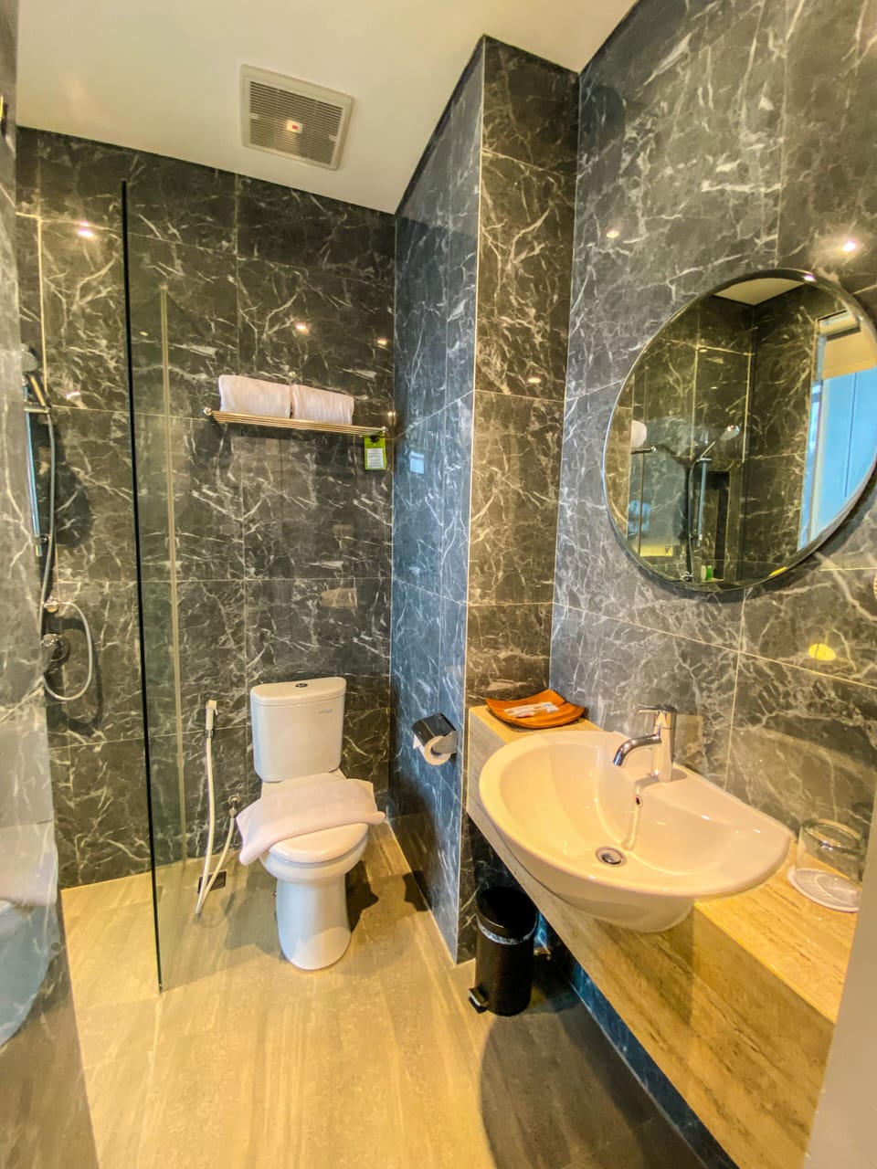 Shower, slippers, towels, soap