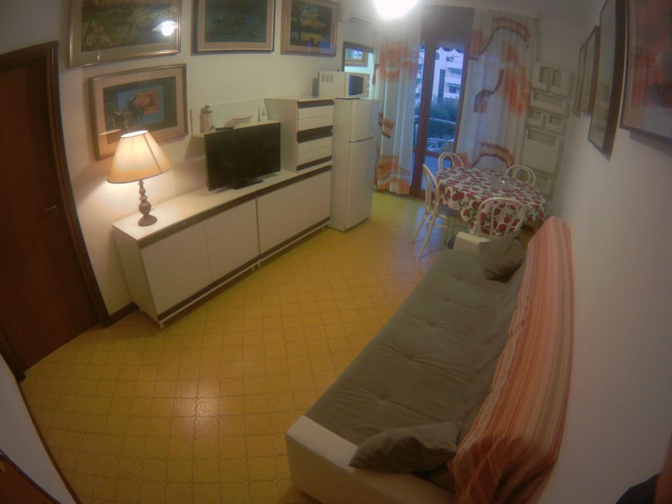Family Apartment, 1 Bedroom, Partial Sea View | Living area | Flat-screen TV