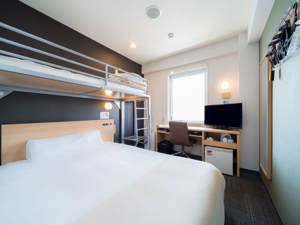 Down comforters, desk, WiFi (free), bed sheets