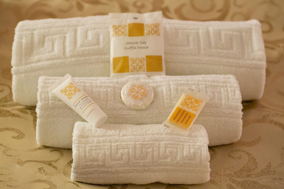 Deluxe Quadruple Room | Premium bedding, down comforters, individually furnished, desk