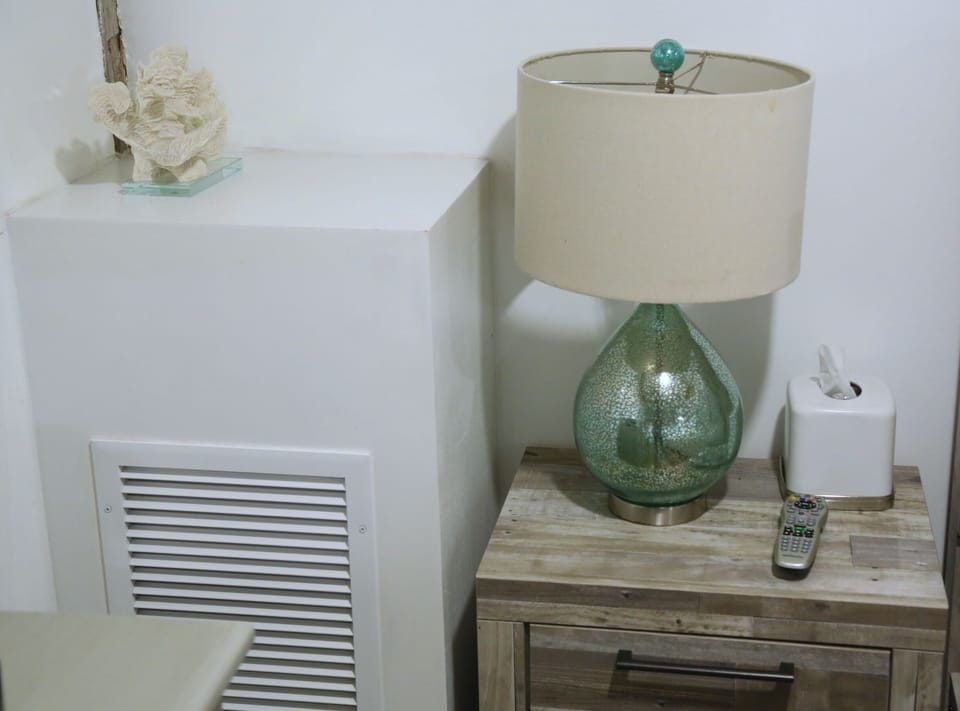 Deluxe King Guest Room | Minibar, in-room safe, individually decorated, individually furnished