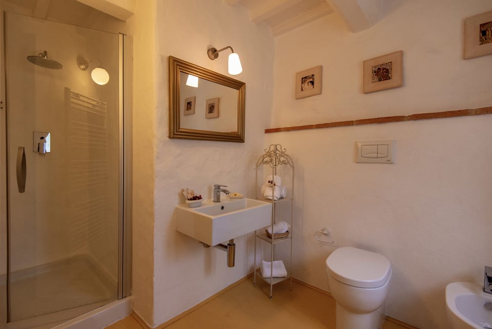 Standard Triple Room, Multiple Beds | Bathroom | Shower, rainfall showerhead, hair dryer, towels